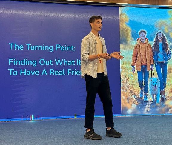 Ondra speaking on stage