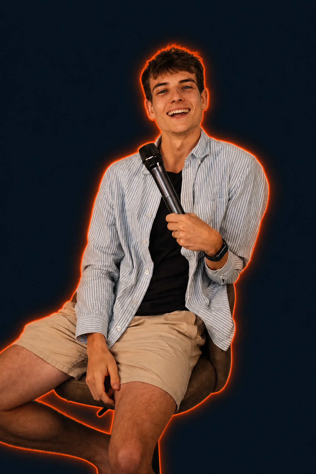 Ondra Němčík smiling with a microphone, outlined in orange